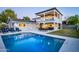 Stunning backyard with a refreshing pool, lounge seating, and a dining area on a multi-level patio at 3824 N 50Th Pl, Phoenix, AZ 85018