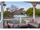 Enjoy mountain and neighborhood views from the outdoor seating on this cozy balcony at 3824 N 50Th Pl, Phoenix, AZ 85018