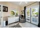 Cozy Bedroom with a chair, dresser, and views to the exterior yard at 3824 N 50Th Pl, Phoenix, AZ 85018
