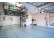 Spacious garage with storage solutions and epoxied floor at 3824 N 50Th Pl, Phoenix, AZ 85018