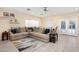 Spacious living room with large sectional sofa, neutral colors and lots of natural light at 3824 N 50Th Pl, Phoenix, AZ 85018