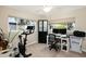 Office space featuring carpet floors, dual monitors, and windows to the exterior at 3824 N 50Th Pl, Phoenix, AZ 85018