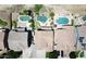 Overhead aerial view of residences, yards, and swimming pools in a housing community at 44236 W Adobe Cir, Maricopa, AZ 85139