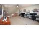 Open loft area with neutral carpet and a ceiling fan is perfect for an additional work space at 44236 W Adobe Cir, Maricopa, AZ 85139