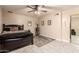 Bedroom with a ceiling fan, decorative pictures, neutral colors and carpet at 4441 W Windrose Dr, Glendale, AZ 85304