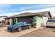 Charming house featuring a two-car garage and desert landscaping in a sunny neighborhood at 4441 W Windrose Dr, Glendale, AZ 85304