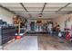 Organized garage space featuring ample storage, a washing machine, and plenty of room for projects and parking at 4441 W Windrose Dr, Glendale, AZ 85304