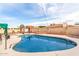 Inviting pool area surrounded by brick accents and outdoor furniture, perfect for relaxing and entertaining at 4441 W Windrose Dr, Glendale, AZ 85304