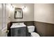 Charming powder room featuring a modern vanity, sink, fixtures, and updated toilet at 4449 E Rancho Caliente Dr, Cave Creek, AZ 85331