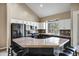 Bright kitchen featuring stainless appliances, granite counters, and white cabinets, ideal for cooking at 4449 E Rancho Caliente Dr, Cave Creek, AZ 85331