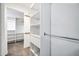 Spacious walk-in closet with custom shelving and tile flooring for optimal storage at 4449 E Rancho Caliente Dr, Cave Creek, AZ 85331