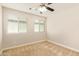 Bright carpeted bedroom with natural light from two windows at 4853 S Charger --, Mesa, AZ 85212