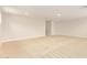 Spacious, carpeted bonus room offering ample space for entertainment and relaxation at 4853 S Charger --, Mesa, AZ 85212