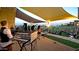People enjoying a live music event on the lawn in the Eastmark community at 4853 S Charger --, Mesa, AZ 85212