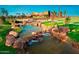 Scenic view of community park featuring a water feature, walking paths, and modern architecture at 4853 S Charger --, Mesa, AZ 85212