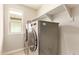 Laundry room features new appliances and a bright window providing ample natural light at 4853 S Charger --, Mesa, AZ 85212