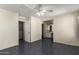 Primary bedroom with adjacent ensuite bathroom at 5104 W Fulton St, Phoenix, AZ 85043