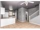 Open floor plan with breakfast bar connecting the living room and kitchen at 5104 W Fulton St, Phoenix, AZ 85043