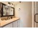 Bright bathroom featuring a spacious vanity with modern fixtures and lighting at 5166 N 83Rd St, Scottsdale, AZ 85250