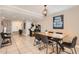 Open dining and gaming area leading to the entryway, creating a flexible and inviting space at 5166 N 83Rd St, Scottsdale, AZ 85250