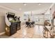Spacious area with game consoles, dining table, and chairs, perfect for entertaining guests at 5166 N 83Rd St, Scottsdale, AZ 85250