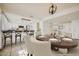 Stylish dining area that transitions to the modern kitchen area with barstool seating at 5166 N 83Rd St, Scottsdale, AZ 85250