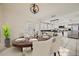 A dining area with french doors features stylish decor that transitions to the kitchen at 5166 N 83Rd St, Scottsdale, AZ 85250