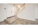 Welcoming entryway showcases a tiled floor and staircase leading to the upper level at 5166 N 83Rd St, Scottsdale, AZ 85250