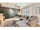 Stylish living room featuring a comfortable sectional sofa, modern decor, and ample natural light at 5166 N 83Rd St, Scottsdale, AZ 85250