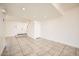 Bright living space with tiled floor, and neutral colored walls at 5166 N 83Rd St, Scottsdale, AZ 85250