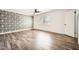 Serene main bedroom with hardwood floors, decorative wallpaper, and ample natural light at 5166 N 83Rd St, Scottsdale, AZ 85250