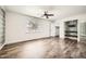 Main bedroom featuring hardwood floors, modern wall decor and a closet at 5166 N 83Rd St, Scottsdale, AZ 85250