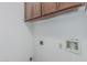 Bright laundry room showcasing the convenience of in-home utility connections at 560 E San Pedro Ave, Gilbert, AZ 85234