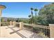 A charming balcony with beautiful green foliage in the background at 5726 W Park View Ln, Glendale, AZ 85310
