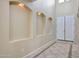 Bright foyer with recessed lighting, decorative niches, tiled floor, and a double-door entry at 5726 W Park View Ln, Glendale, AZ 85310