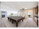 Game room featuring a pool table, neutral carpeting, and lots of space for entertaining at 5726 W Park View Ln, Glendale, AZ 85310