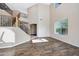 Bright living room showcases a staircase, large window, wood floors, and a serene atmosphere at 5726 W Park View Ln, Glendale, AZ 85310