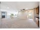 Bright and spacious loft area with carpet flooring and natural light from the windows at 5726 W Park View Ln, Glendale, AZ 85310