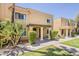 Attractive exterior view of condo with desert landscaping, neutral paint, and covered entrance at 601 E Palo Verde Dr # 27, Phoenix, AZ 85012