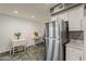 Kitchen area with stainless steel appliances, a workstation, and a dining area at 601 E Palo Verde Dr # 27, Phoenix, AZ 85012