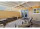 Covered patio featuring outdoor seating, a rug, and access to the yard at 601 E Palo Verde Dr # 27, Phoenix, AZ 85012