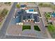 Aerial view shows a modern home with lush landscaping and a sparkling pool at 6147 E Desert Cove Ave, Scottsdale, AZ 85254