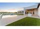 Backyard pool and spa with an outdoor kitchen perfect for entertaining at 6147 E Desert Cove Ave, Scottsdale, AZ 85254