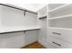 Bright closet with shelves, drawers, and ample hanging space at 6147 E Desert Cove Ave, Scottsdale, AZ 85254