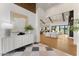 Welcoming foyer with sleek console table that opens to a spacious living area with lots of natural light at 6147 E Desert Cove Ave, Scottsdale, AZ 85254