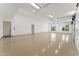 Spacious three car garage with epoxy flooring and lots of natural light at 6147 E Desert Cove Ave, Scottsdale, AZ 85254