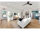 Bright living room with stylish decor, hardwood floors, modern furniture, and an inviting atmosphere at 6147 E Desert Cove Ave, Scottsdale, AZ 85254