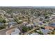 Aerial view of a residential neighborhood featuring mature trees, pools, and well-maintained homes at 6207 E Rose Circle Dr, Scottsdale, AZ 85251