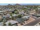 An aerial view shows neighborhood homes on a bright day, capturing the community's layout and surroundings at 6207 E Rose Circle Dr, Scottsdale, AZ 85251