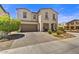 Charming two-story home showcasing a well-manicured front yard and inviting covered porch at 6503 E Bluefield Ave, Phoenix, AZ 85054
